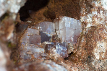 Cubic calcite crystals grown in a rock cavity