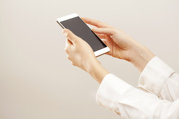 Woman hands holding phone