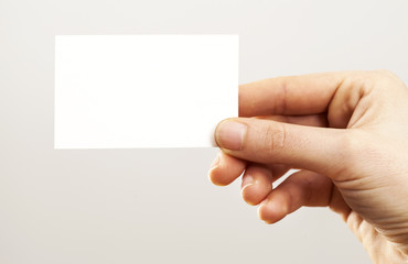 Obraz premium Woman hand holding blank business card