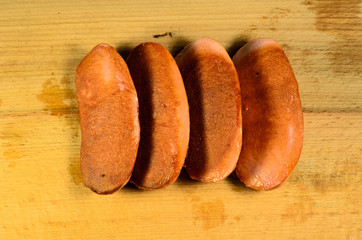 Fried sausages isolated on white