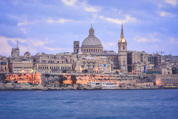 Fototapeta na wymiar Valletta cityscape seen from Sliema bay