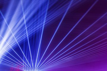Laser beams in the night sky