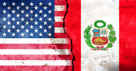 A large crack in the wall. USA flag. Flag of Peru