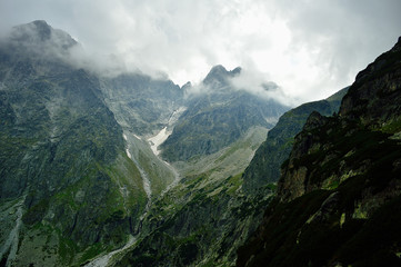 Fototapeta na wymiar High Tatras in Slovakia. Monumental peaks. Summer scenic landscape mountain view. Alpine trail.