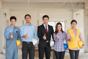 Fototapeta premium Group of engineers, architects and foreman at a construction sit
