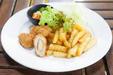 Cordon bleu and french fries served