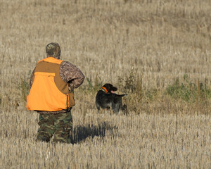 A hunter and his dog