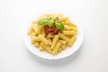 dish with macaroni and tomato sauce,isolated on white background