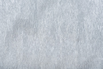 Wrinkled paper silver color background. Paper for packaging.