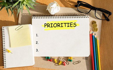 Notebook with Toolls and Notes about Priorities