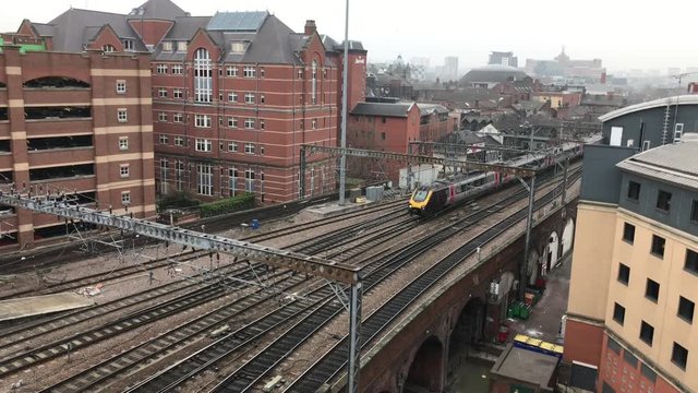 LEEDS CITY CENTRE TRAIN STATION UK 26/01/17 - An express Cross Country train arrives at Leeds Station 4K