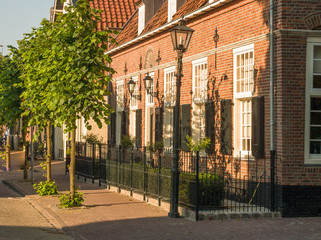 Fototapeta na wymiar Historical houses in Bunschoten-Spakenburg, Utrecht, Holland, NL