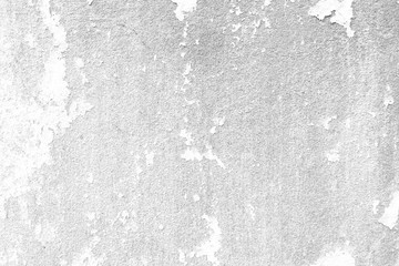 Weathered concrete wall with plastering/paint peeled off in black&white.