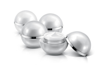 Several silver sphere cosmetic jar on white background