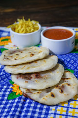 Pupusas from El Salvador, from bean to cheese on a typical Salvadoran blanket. - 136231489