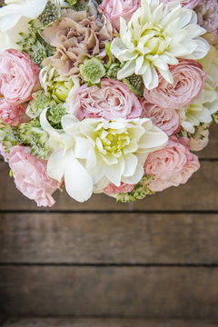 Wedding bouquet with roses, dahlias and carnations