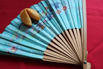 Fortune Cookie Moody Lighting set on blue paper fan