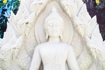 Close-Up of Marble Buddha Statue with Naga Heads