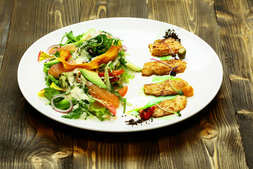 Fried fish and salad mix
