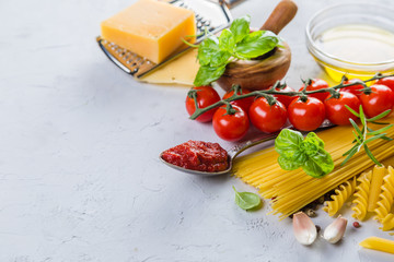 Raw pasta ingredients background
