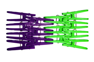 Colorful purple,green clothes peg isolated on white background