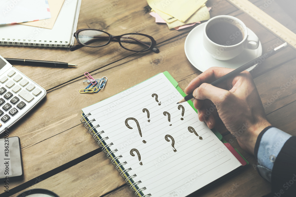 Poster man written question mark on notepad