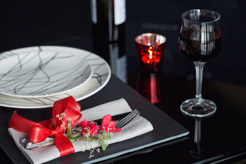 Table place setting with holidays decoration.