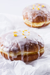 Fresh polish donuts on a white background