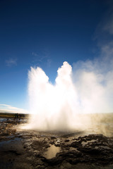 Strokkur Geysir Eruption against the Sun, Iceland