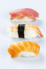 Salmon and tuna sushi isolated on a white background