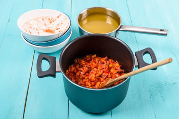 Cooking Minestrone Soup On Kitchen Table