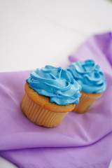 Mini cake with blue foam top. Detail of a mini birthday cake.