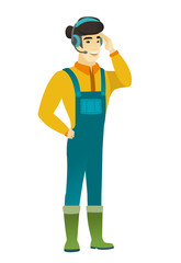 Asian farmer in headset with microphone.