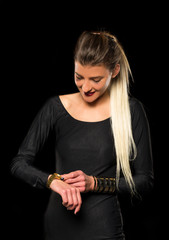 young bussines woman looking time on watch