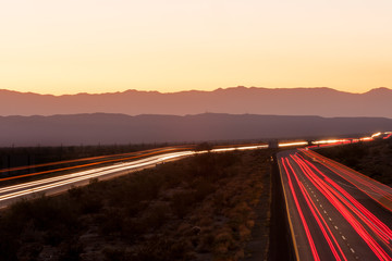 Nighttime traffic on Interstate I-10 through the desert in California