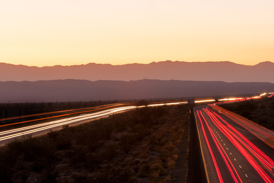 Nighttime traffic on Interstate I-10 through the desert in California
