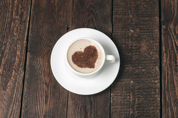 Coffee cup with heart shape. Top view