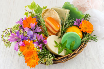 Herbal soaps and fresh spring flowers
