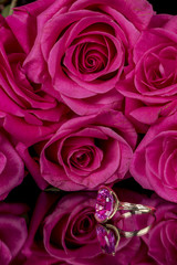 Pink roses and a ring of the same color