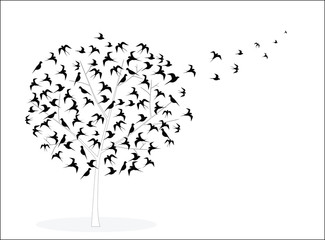 Vector picture with tree crown in the form of birds, some of which flies away