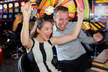 Couple celebrating casino victory