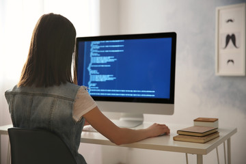 Fototapeta na wymiar Woman working on computer at home