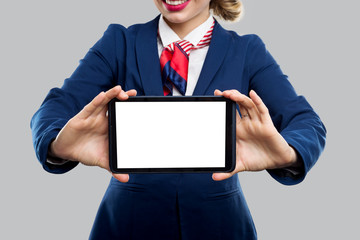 Elegant business woman shows tablet. Touchpad mockup.