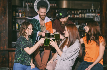 People celebrating Saint Patrick's Day in pub
