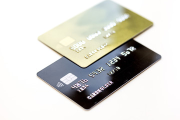 pile of credit cards on white background