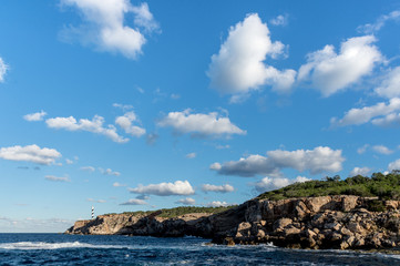 Fototapeta premium Lighthouse in the cliffs of Ibiza