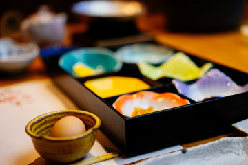 Japanesse style cuisine with colorful dishes.
