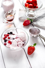 organic homemade ice cream in glass bowl on wooden background