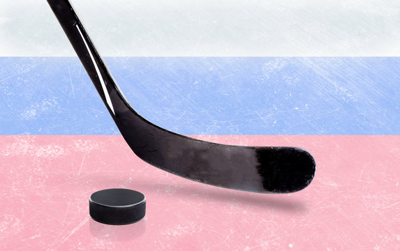 Hockey Stick and Puck with Russian Flag on Ice
