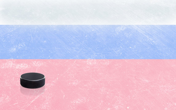 Hockey Stick and Puck with Russian Flag on Ice